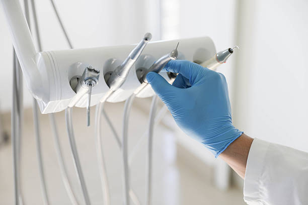 Professional Tooth Extraction technician working in Fremont, NC